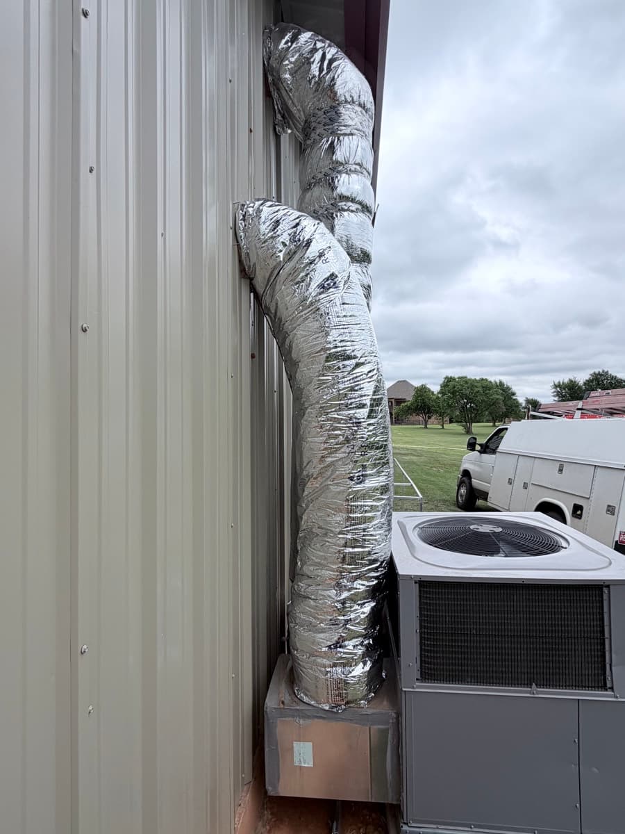 New flex duct routed clean on rooftop install