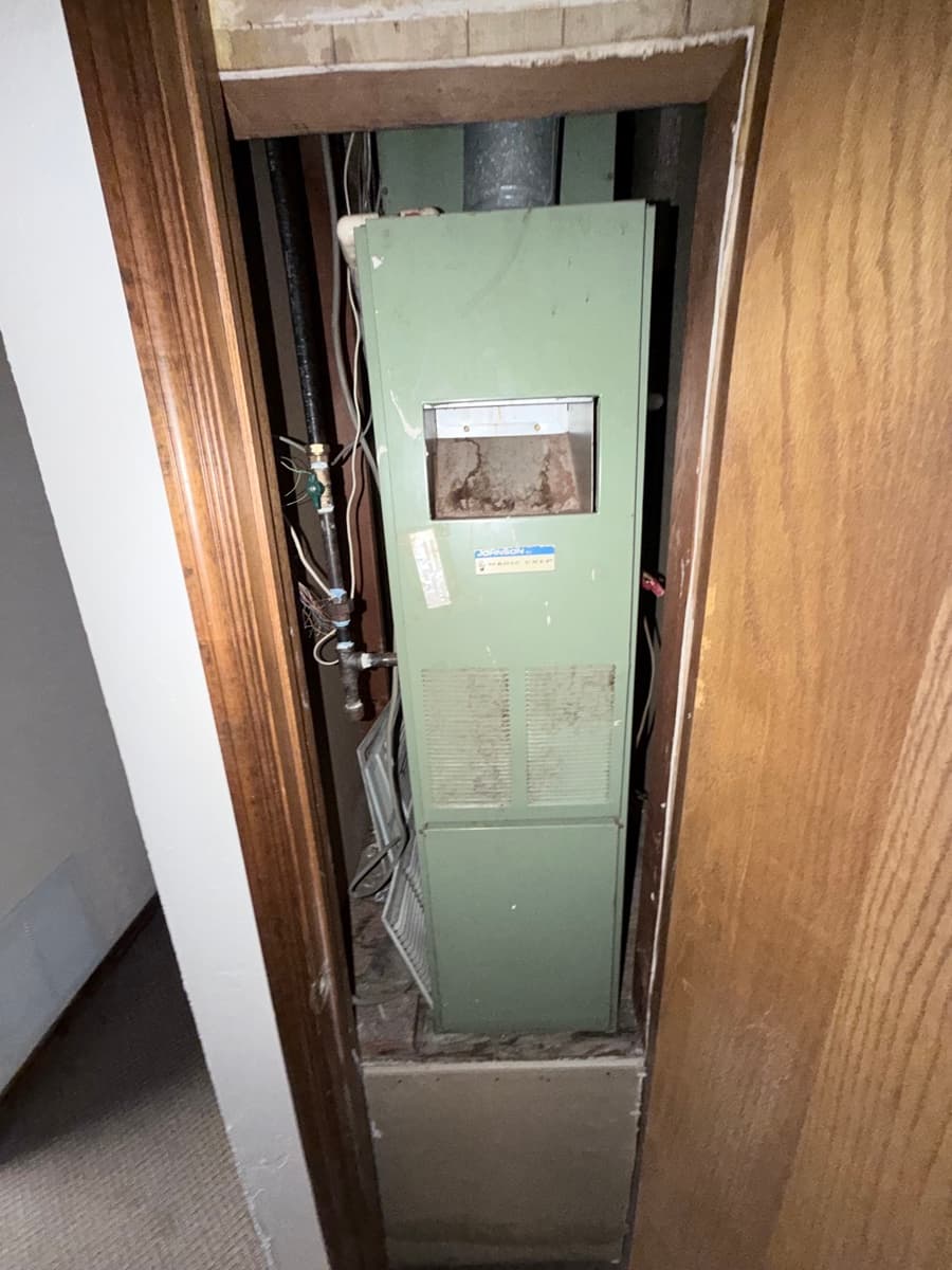 Old air handler in tight space — past its life